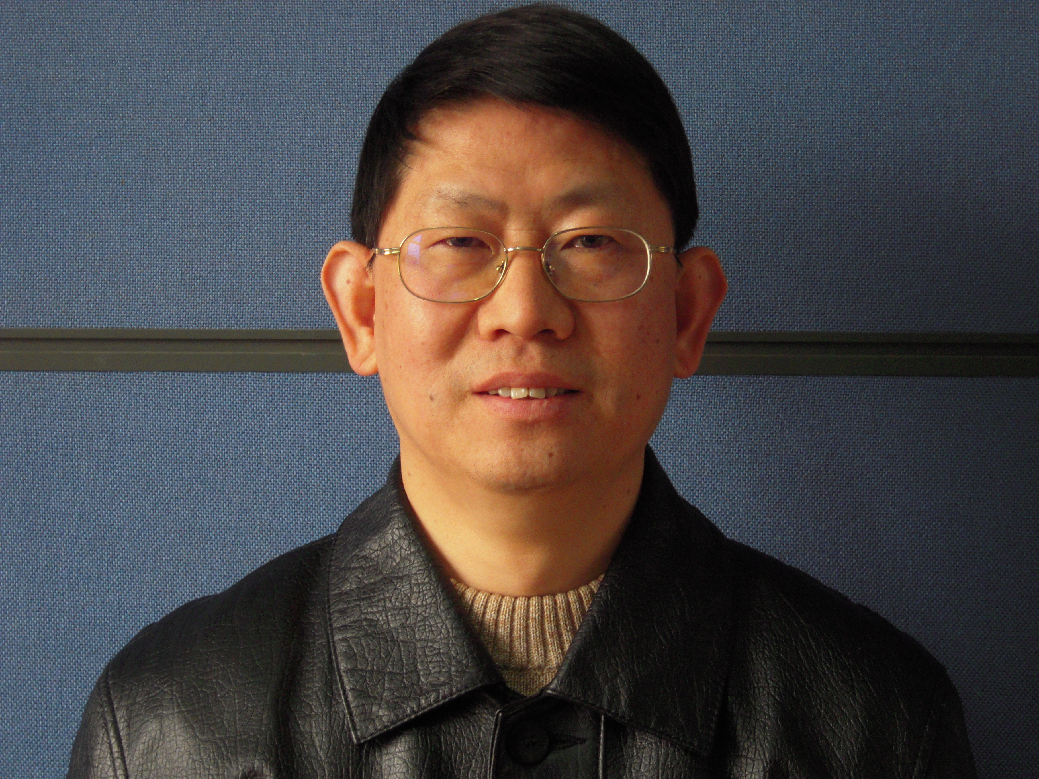   Mr. Wang Huawen